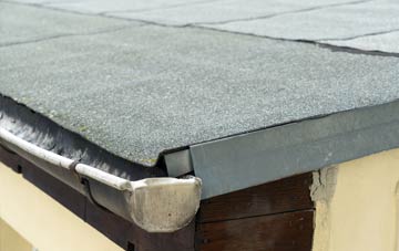 repair or replace Ash Grove flat roofing?